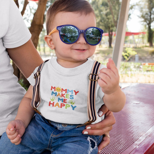 Baby wearing Mommy Makes Me Happy toddler tee with suspenders and sunglasses sitting outside