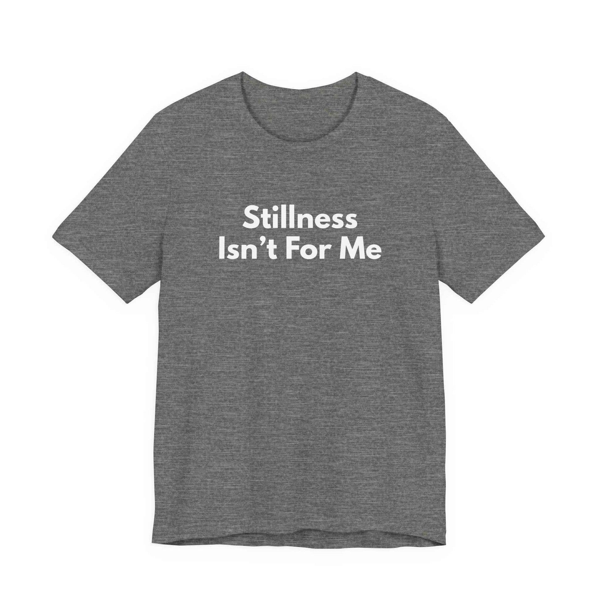 Flat lay heather gray Stillness Isn't For Me graphic tee — restless soul graphic tee
