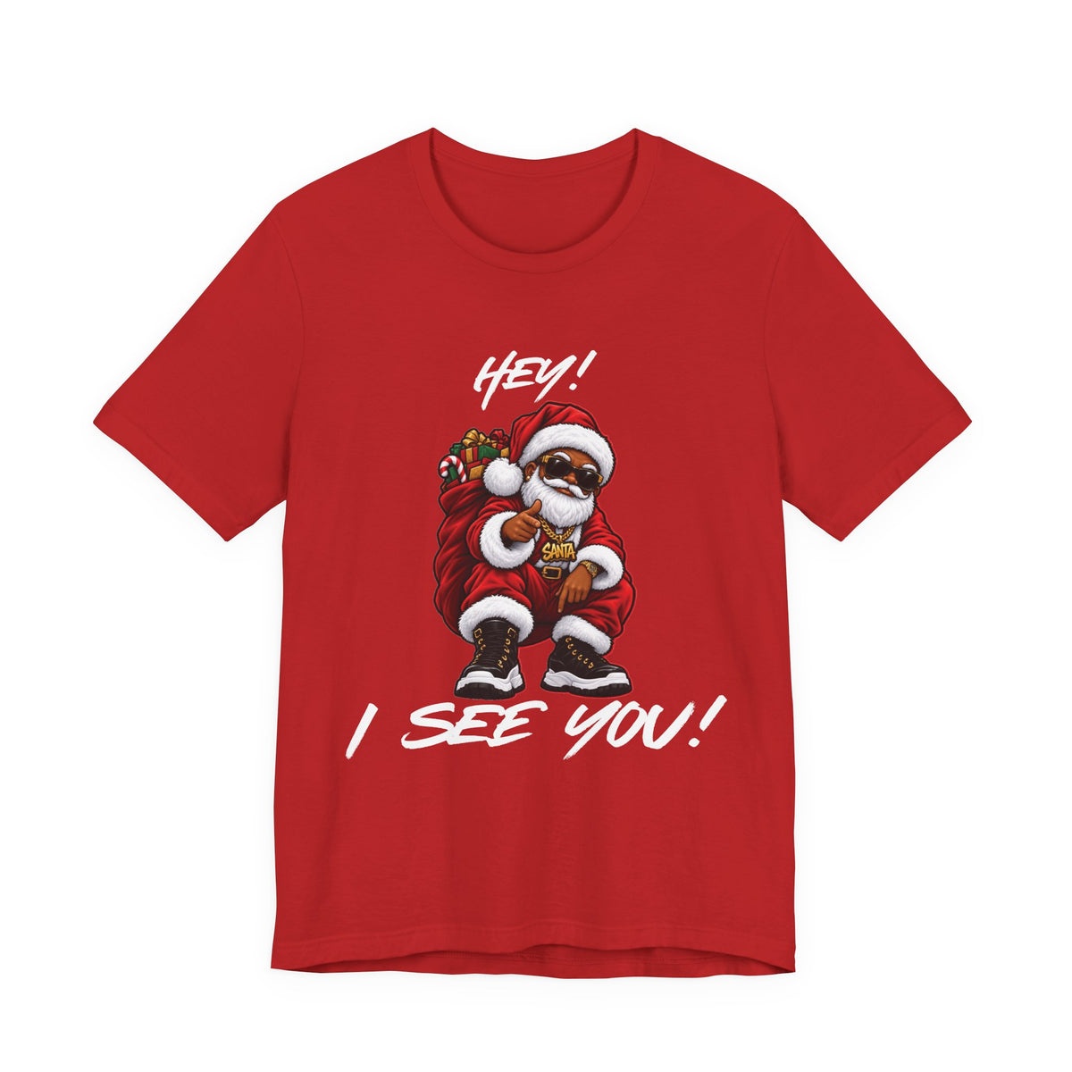 Red Christmas t-shirt featuring Santa in sunglasses pointing outward, with Hey! above him and I See You! below.
