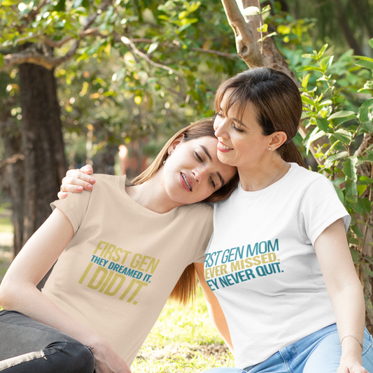 Two women in First Gen Mom graduation tee streetwear style outdoor celebration