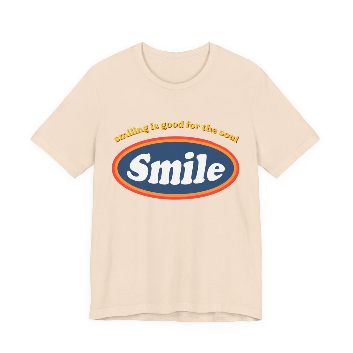 Leela's Ink Smile Retro Graphic Tee in natural — flat lay showing retro 'Smiling Is Good for the Soul' oval Smile graphic on unisex crew neck tee

