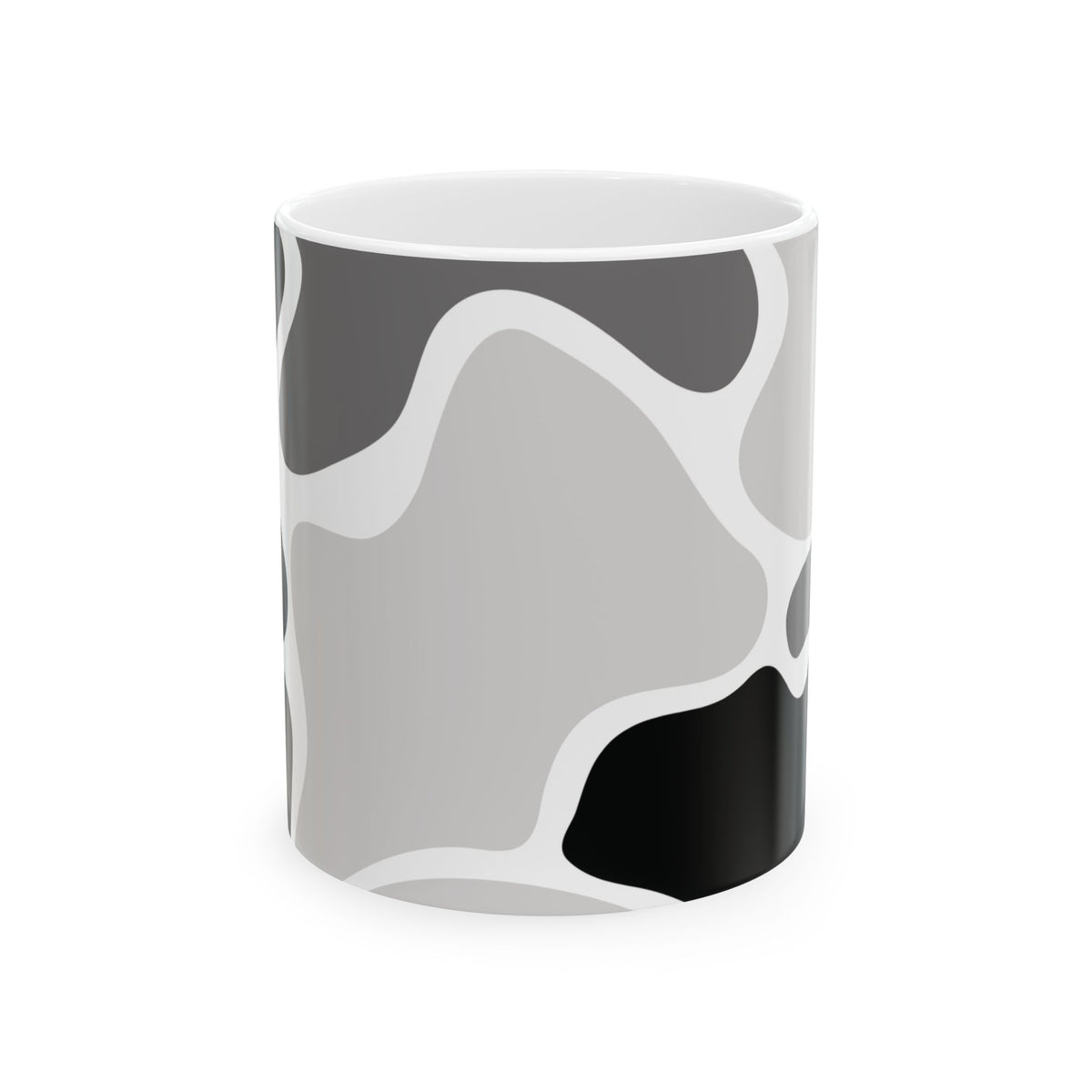 Front view of a white mug featuring a black and gray abstract pattern.