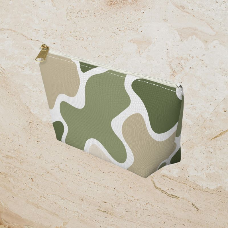Angled view of the camouflage pouch showing its side profile and zipper.