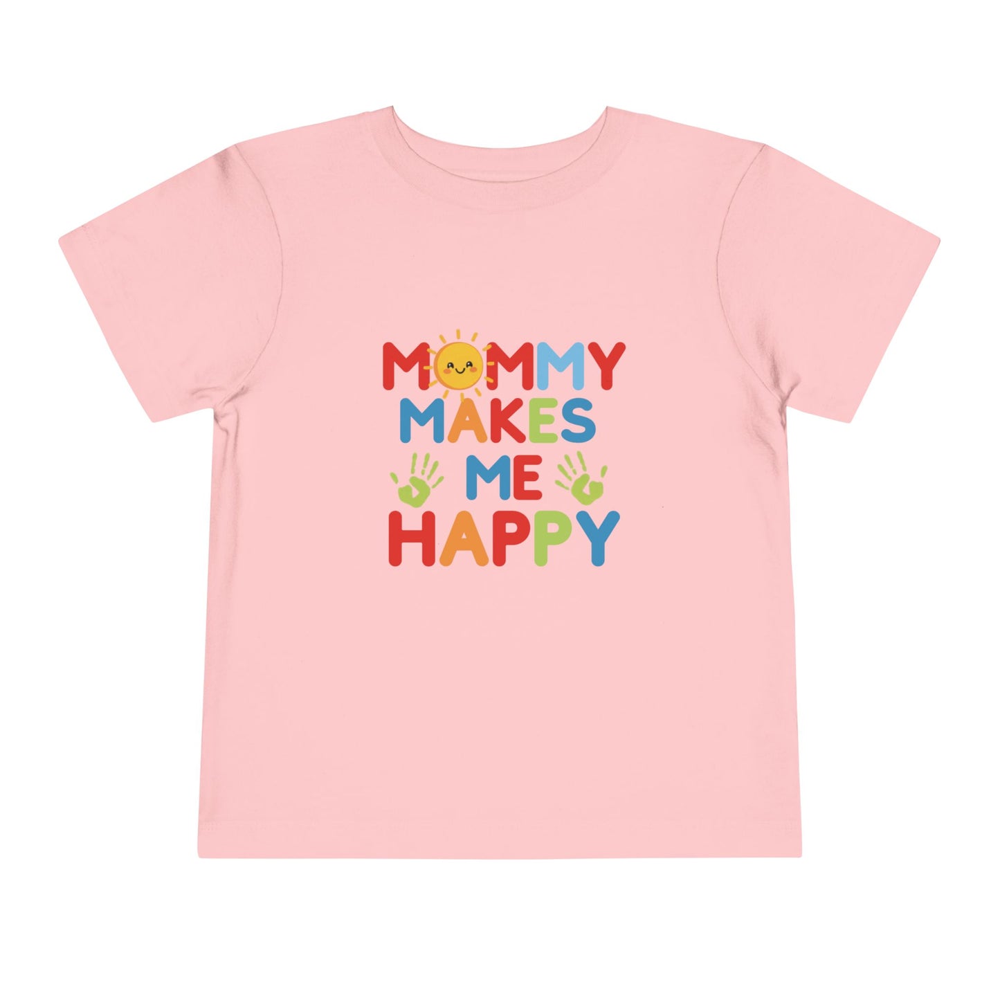 Flat lay of pink toddler tee with Mommy Makes Me Happy rainbow smiley sun design
