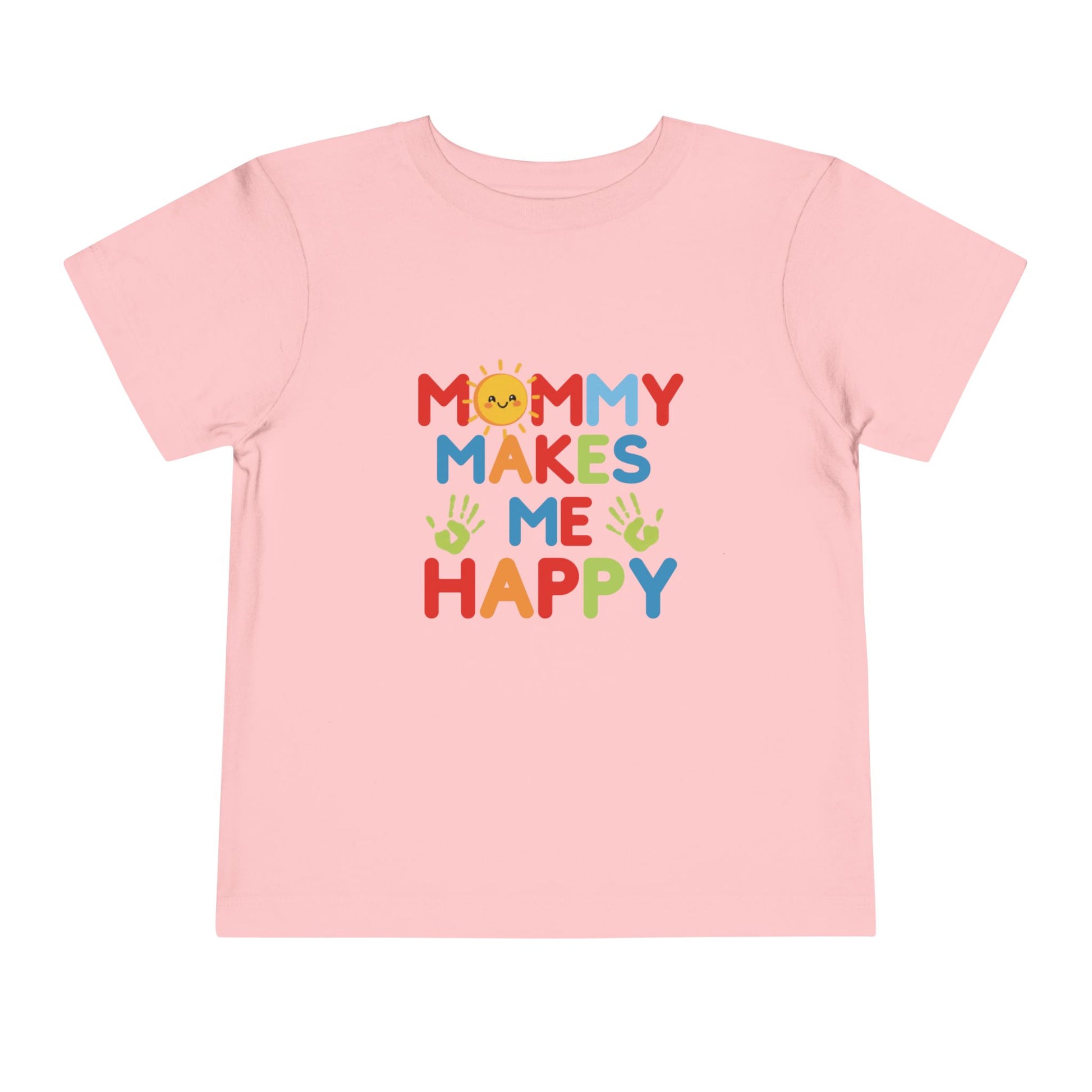 Flat lay of pink toddler tee with Mommy Makes Me Happy rainbow smiley sun design
