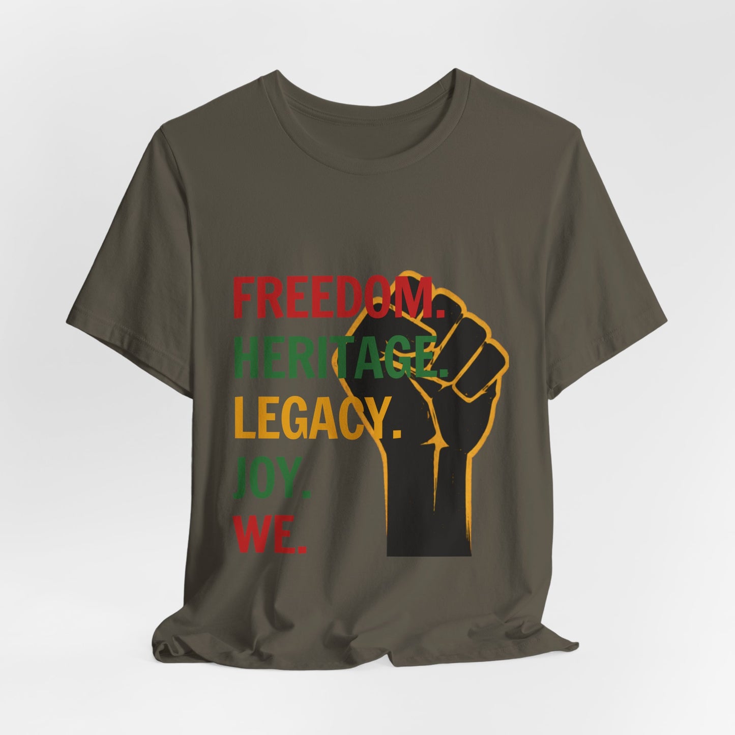 "Freedom Heritage Legacy Joy We Juneteenth Tee in Army Green – alternate flat lay mockup showing raised fist Black excellence graphic"

