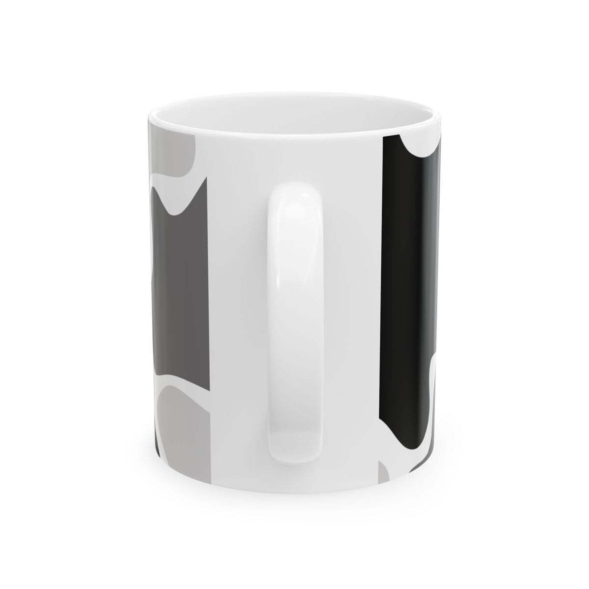 Side view of a white mug showing the black and gray abstract wraparound pattern.