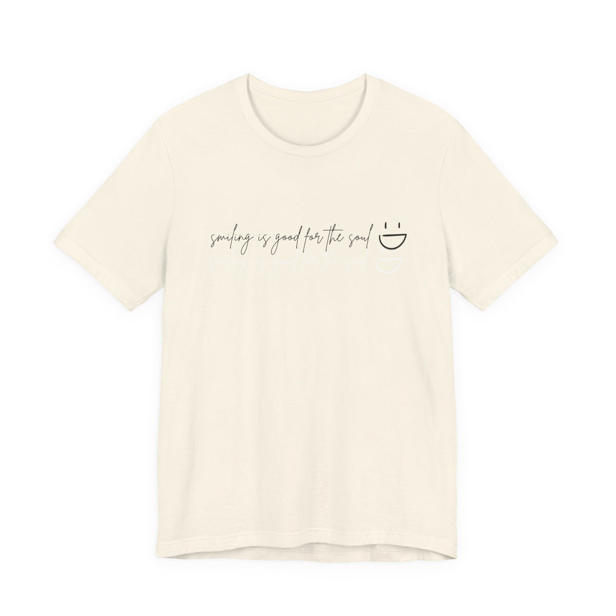 Flat lay Natural/Tan Natural Smiling Is Good for the Soul feel-good women's tee flat lay – Leela's Ink Bella+Canvas 3001 minimalist script graphic

