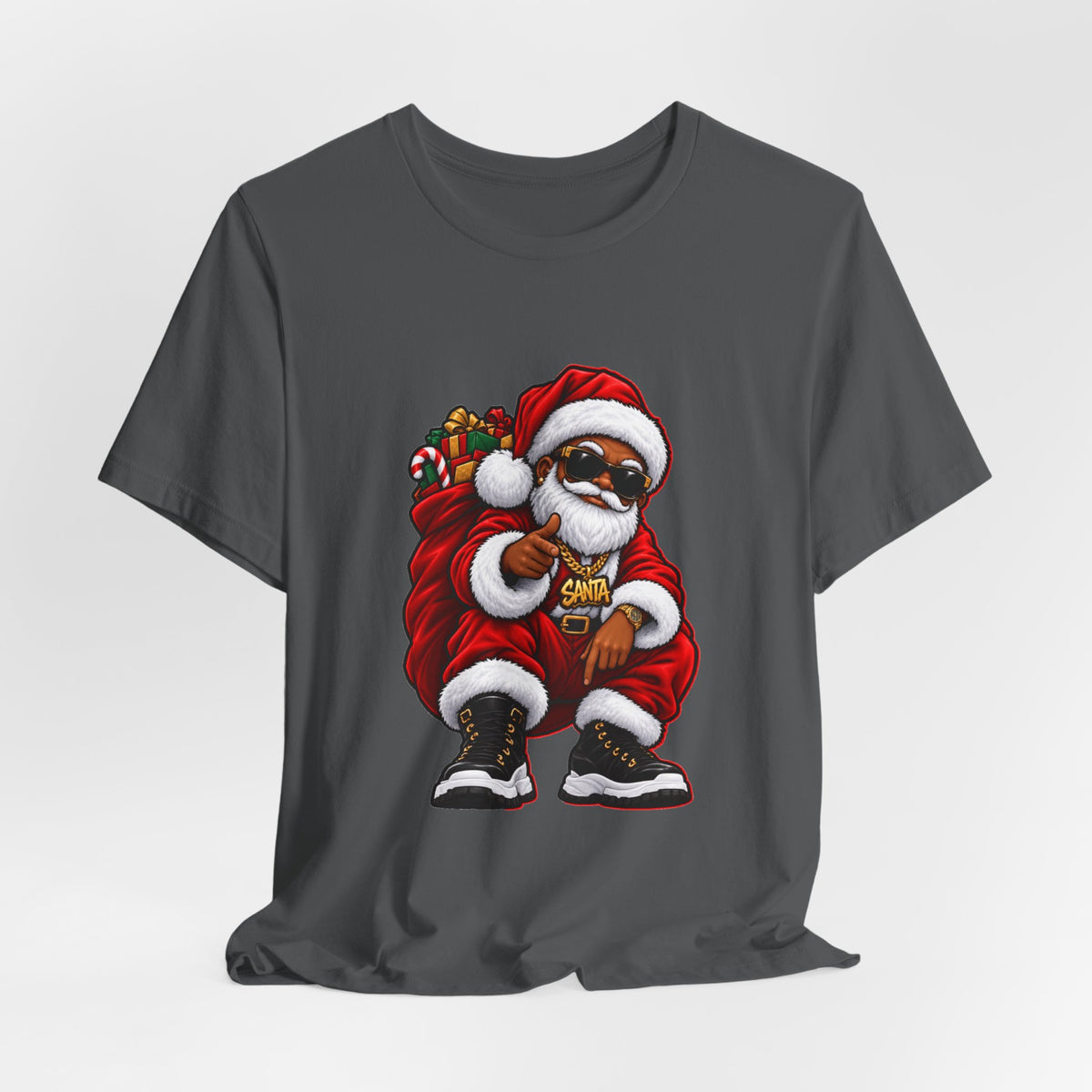 A dark gray crewneck t-shirt featuring a graphic print of a stylized Santa Claus character wearing sunglasses and a gold chain, set against a light gray background.
