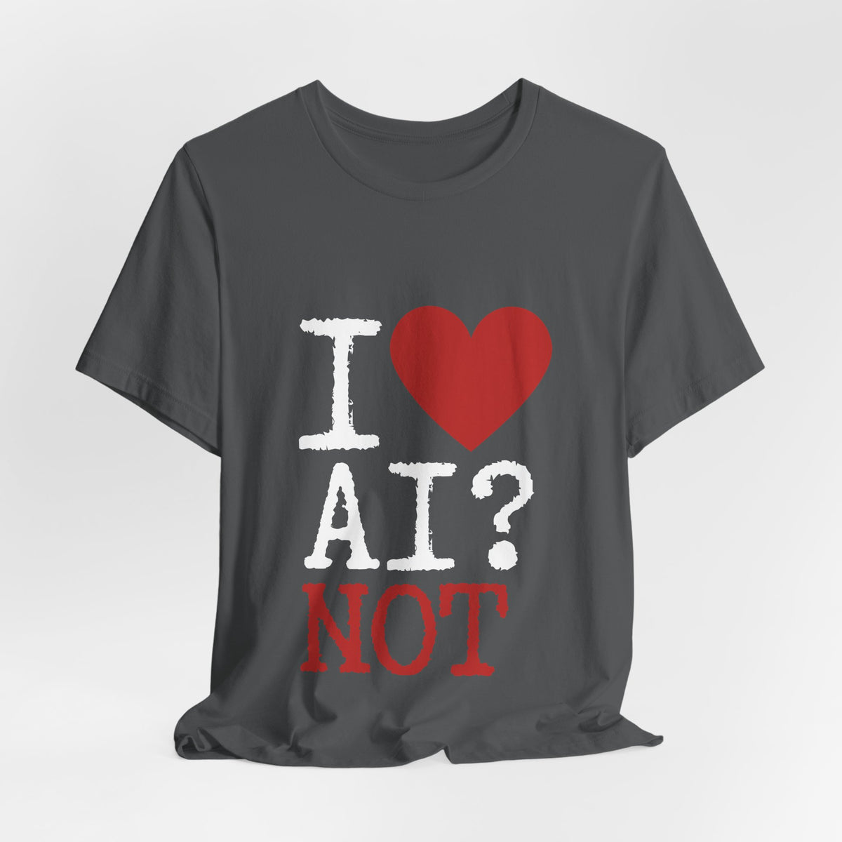 A dark gray t-shirt with a graphic print that reads 'I [red heart] AI? NOT' in white and red text, displayed on a light gray background.