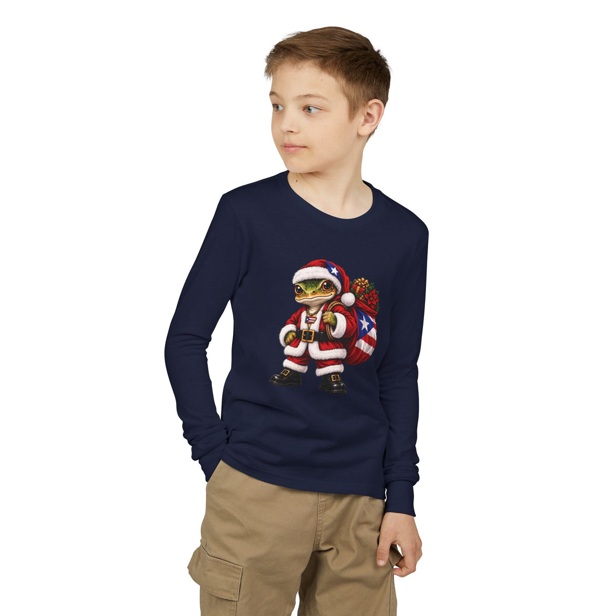 Child wearing a navy long-sleeve Christmas t-shirt featuring a Puerto Rican coquí graphic.