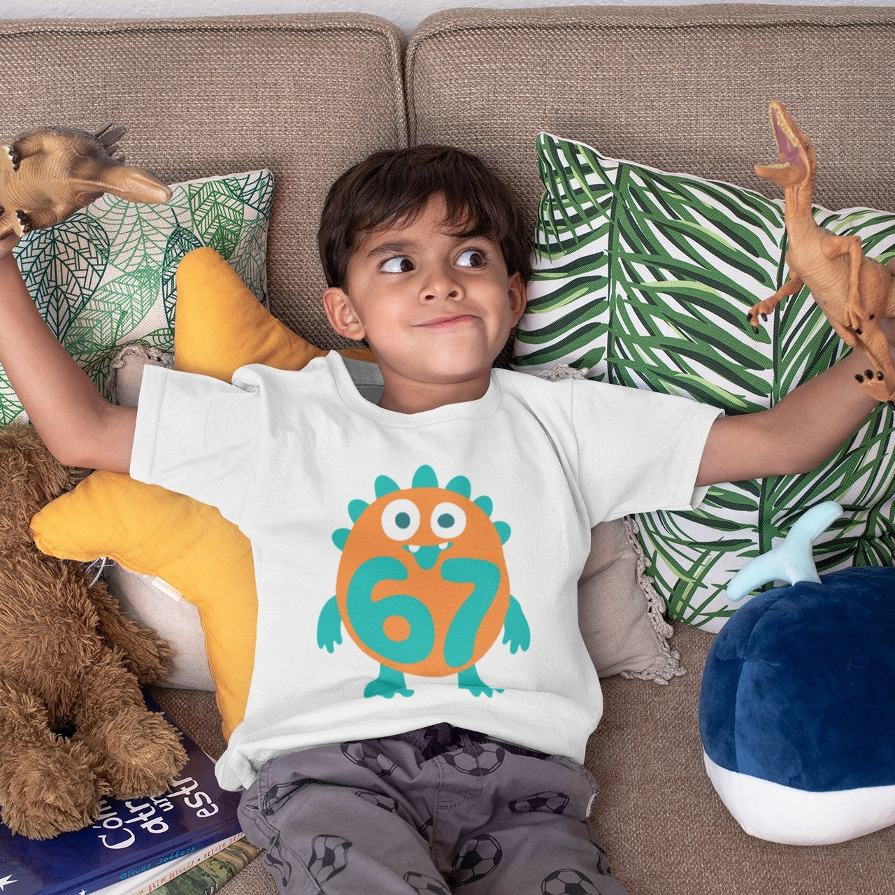 	Boy wearing Kids 6/7 Monster T-Shirt in white, lifestyle shot