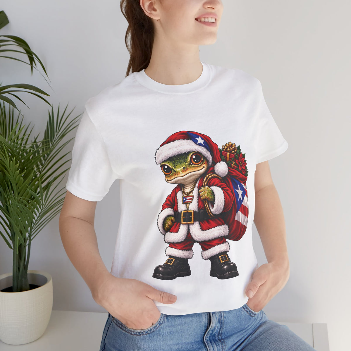 Close-up of a person wearing a white Puerto Rican coquí Santa Christmas t-shirt.