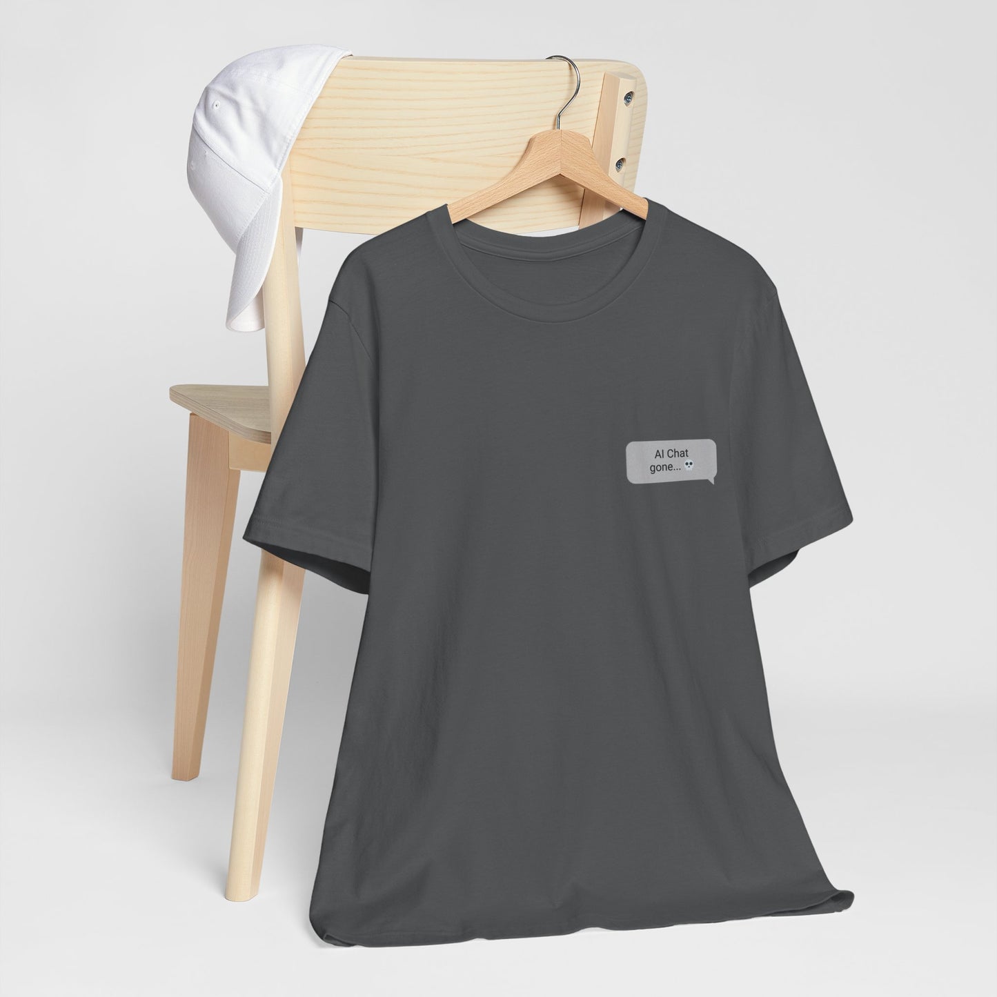 Should I Text Them Again graphic tee in asphalt gray on hanger with left chest chat bubble print
