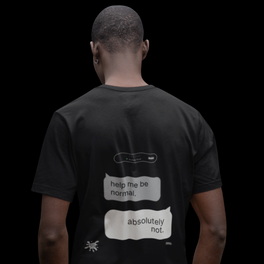 Back view of black graphic tee on dark background, 'help me be normal. absolutely not.' Chat Gone Wild print detail
