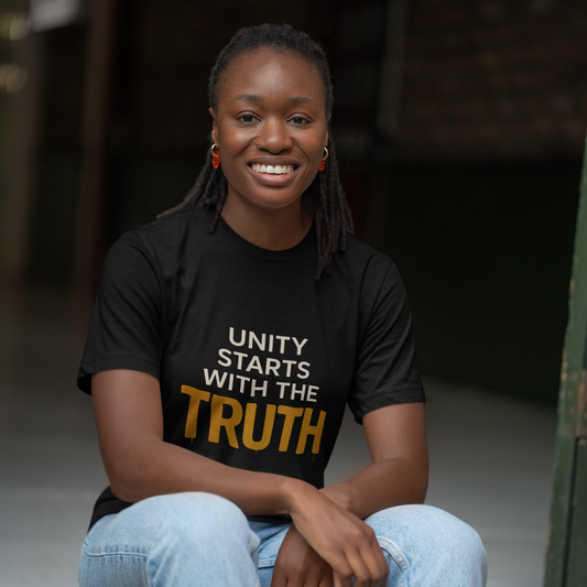 Unity Starts With the Truth graphic tee — bold statement streetwear on female model in black