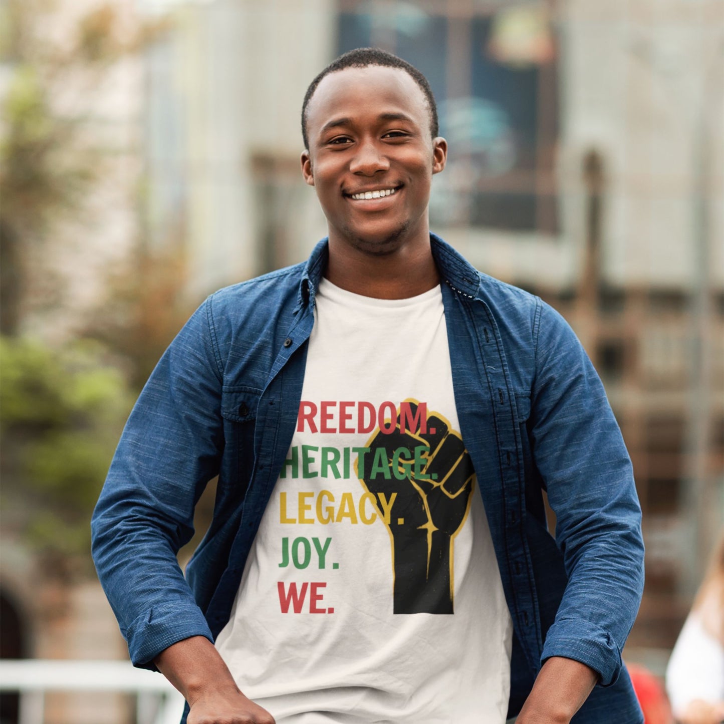 "Freedom Heritage Legacy Joy We Juneteenth Tee in White – man wearing raised fist Black excellence graphic tee with blue jacket"

