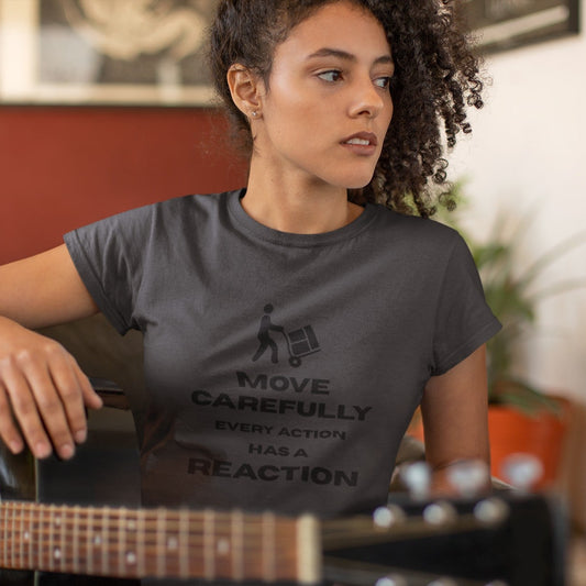 Woman playing guitar in an asphalt Move Carefully Every Action Has a Reaction t-shirt