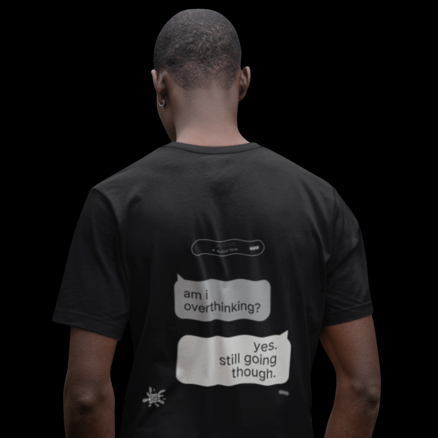 Back view of black graphic tee on dark background, 'am i overthinking? yes. still going though.' Chat Gone Wild print detail