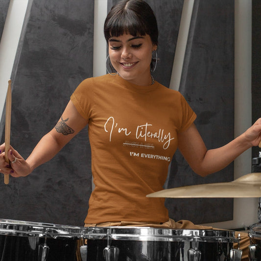 Female drummer wearing "I'm Literally Just a Girl I'm Everything" graphic tee – Leela's Ink empowerment shirt