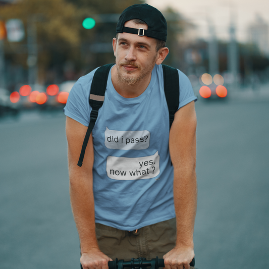 Man wearing Steel Blue did i pass yes now what graduation graphic tee on scooter — streetwear grad photoshoot lifestyle shot