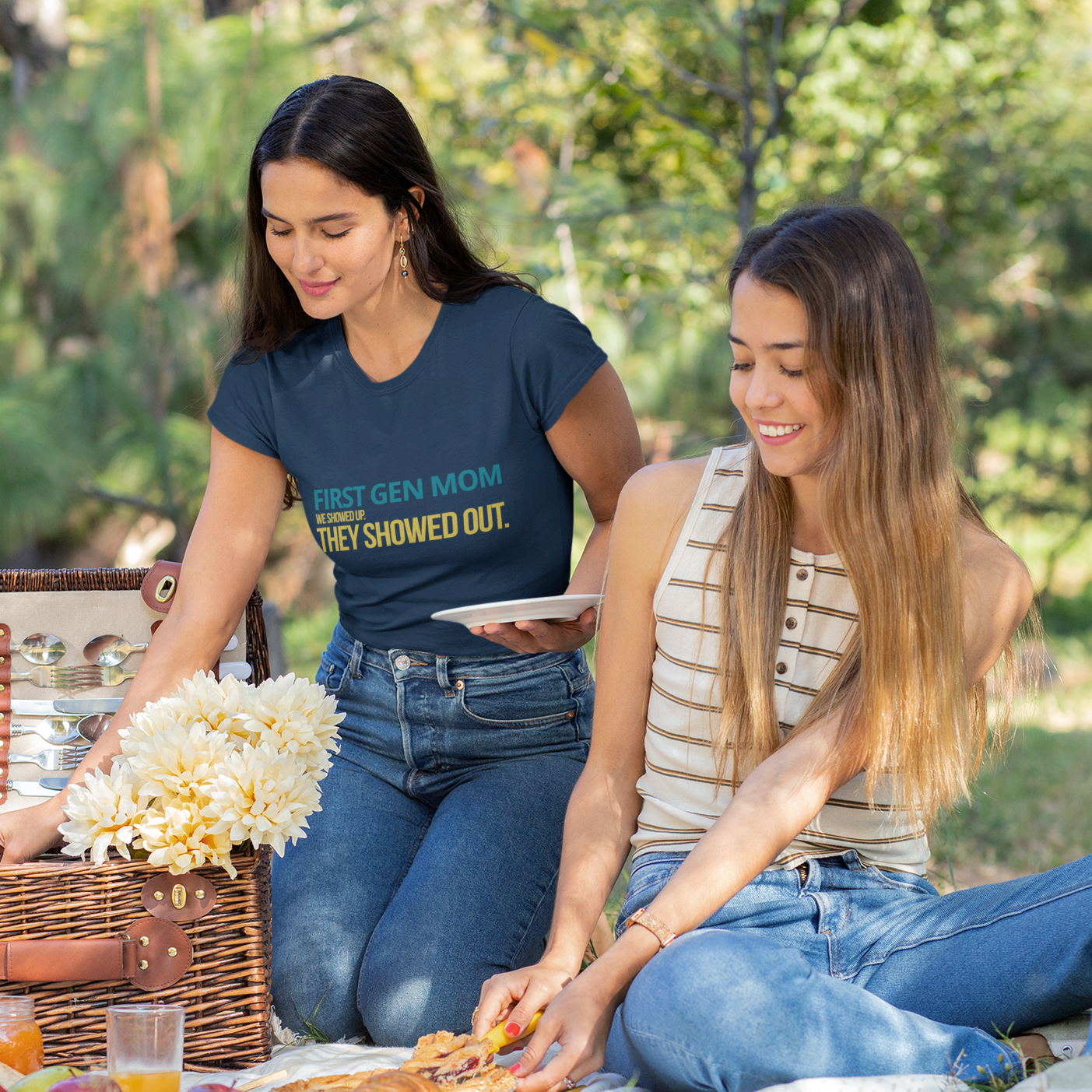 First Gen Mom wearing navy graduation streetwear tee — bold teal and gold We Showed Up They Showed Out graphic — urban grad photoshoot style