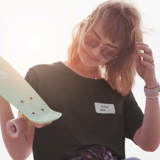 Woman in sunglasses wearing Make Me Productive Today graphic tee in black with chat bubble front print
